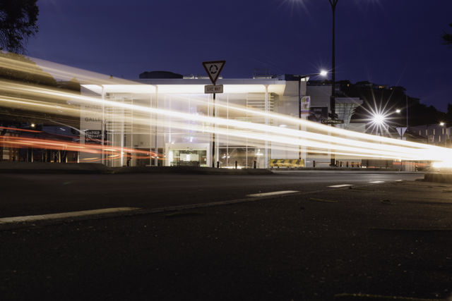 MTG In Lights - A night-time long exposure of Napier's Museum Theatre Gallery (MTG). The cars passing by creating long streaks of bright light.