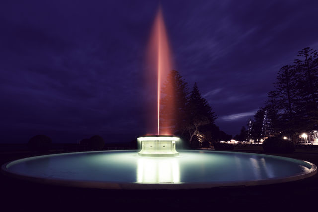 Tom Parker Fountain - At night the fountain comes alive with changes of light and pattern. A rainbow of colours are shown in sequence