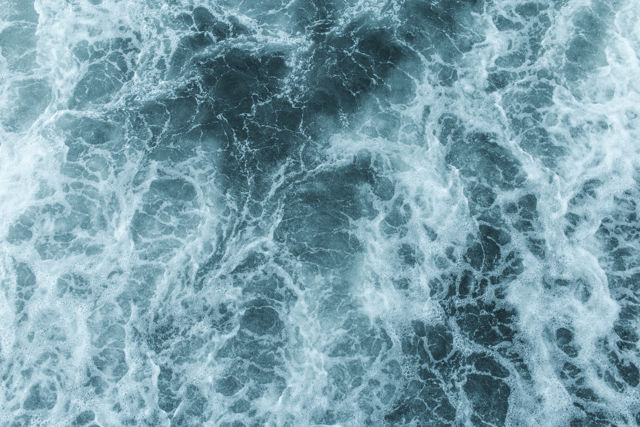 The Teal Below - Looking down to ocean foam