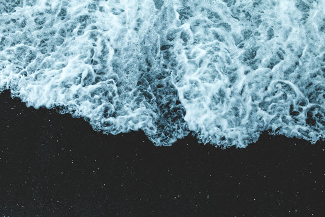 Night Wave 3 - Ocean wave foam on a gravel beach