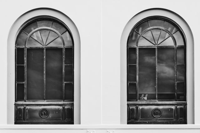 Arch Decisions - Arch windows on a Spanish Mission style building in Napier