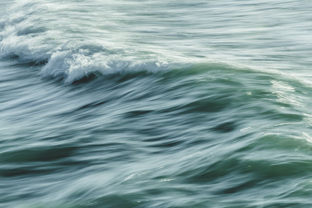 Ocean Bliss - A dreamy wave with a cool slow shutter panning effect.
