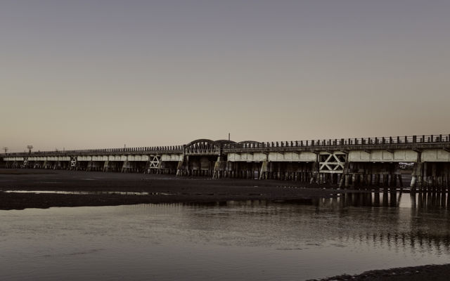 Estuary Rail Bridge - The old railway embankment bridge over Ahuriri Estuary at low tide