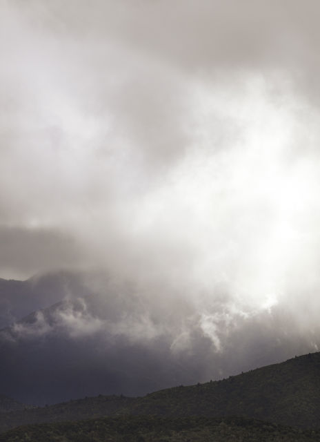 Atmospheric Conditions - Sunlight breaking through the clouds over the Maungaharuru Range