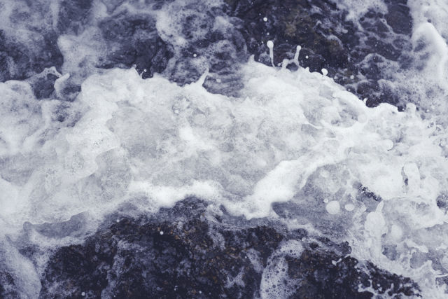 Sea Foam Three - Ocean wave rushing in creating a beautiful foam.
