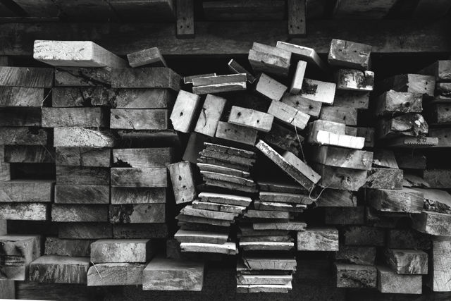 Flat Out - Stacks of sawn timber in a wood shed at Ongaonga.