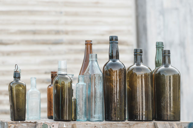 Survivors - A row of vintage bottles seen outside the builder's factory at Ongaonga