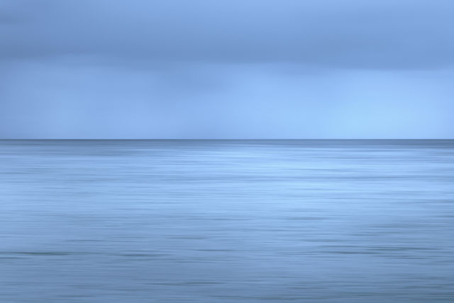 Could Be, All Ours. - A panned shot while viewing out to the ocean on a rainy day.