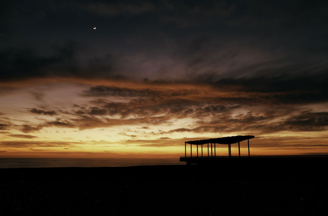How High The Moon - Early morning colourful skies out from Napier with the viewing platform and a glimpse of the moon.